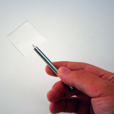 Plan prisme på metalstang